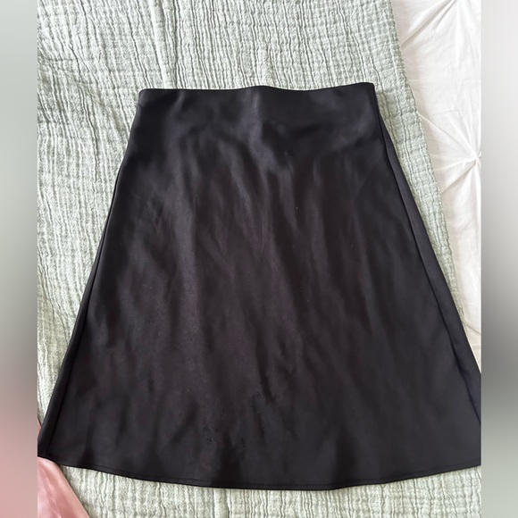 Black and Pink Dynamite satin skirts, both in XXS. - Picture 2 of 8